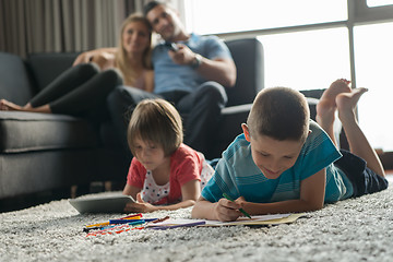 Image showing young couple spending time with kids