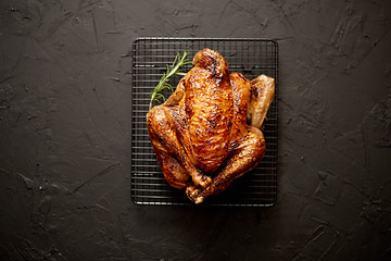 Image showing Homemade baked chicken with rosemary herbs