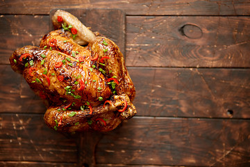 Image showing Homemade roasted spicy chicken with chilli and chive