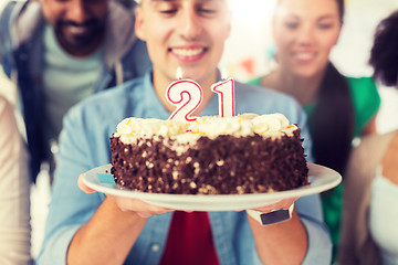 Image showing man with cake and friends at birthday party