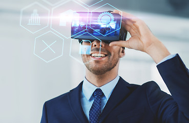 Image showing businessman with virtual reality headset at office