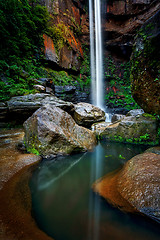 Image showing Tumbling waterfall over cliffs in a gorge