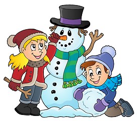 Image showing Kids building snowman theme image 1