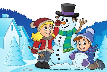 Image showing Kids building snowman theme image 3