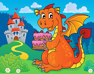 Image showing Dragon holding cake theme image 3