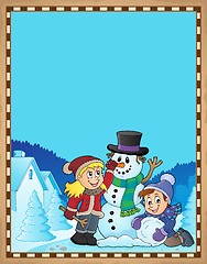 Image showing Kids building snowman theme parchment 1