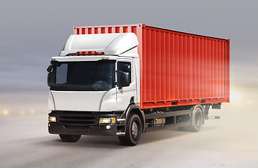 Image showing truck on ice road in snowy weather