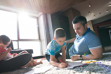 Image showing young couple spending time with kids