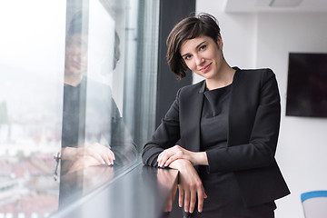 Image showing Portrait of successful Businesswoman by the window