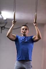 Image showing man doing dipping exercise