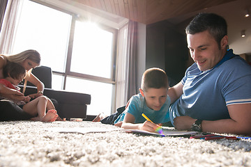 Image showing young couple spending time with kids