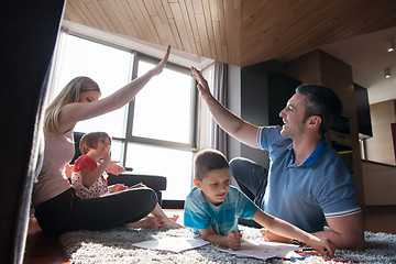 Image showing young couple spending time with kids