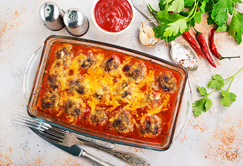 Image showing baked meatballs with sauce