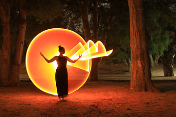 Image showing Colorful Long Exposure Image of a Woman