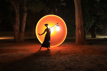 Image showing Colorful Long Exposure Image of a Woman