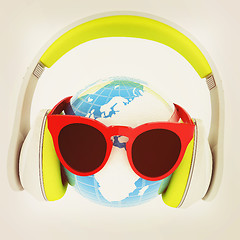 Image showing Earth planet with earphones and sunglasses. 3d illustration. Vin