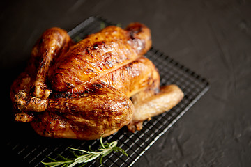 Image showing Homemade baked chicken with rosemary herbs
