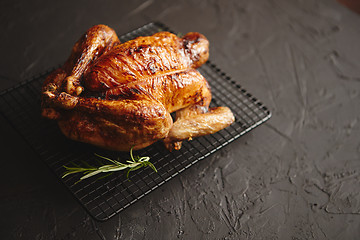 Image showing Homemade baked chicken with rosemary herbs