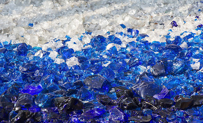 Image showing Many broken pieces of glass in white and blue, as background