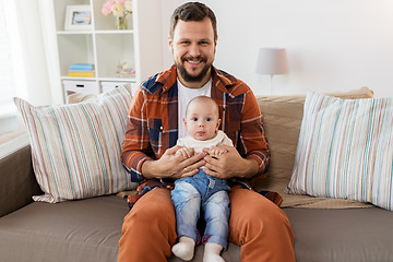 Image showing happy father with little baby boy at home