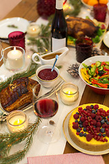 Image showing food and drinks on christmas table at home