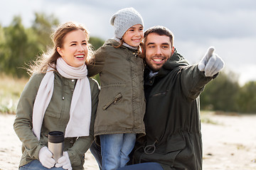 Image showing happy family on autumn beach