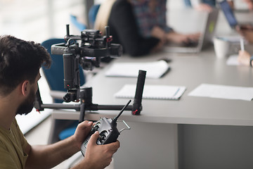 Image showing videographer at work