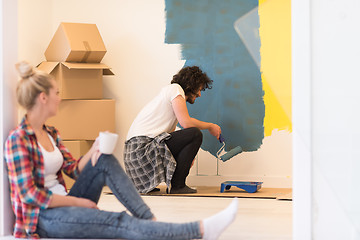 Image showing young couple doing home renovations