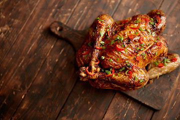 Image showing Homemade roasted spicy chicken with chilli and chive