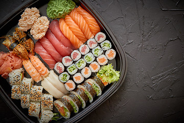 Image showing Various kinds of sushi on plate or platter set