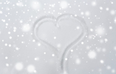 Image showing heart shape silhouette or print on snow surface