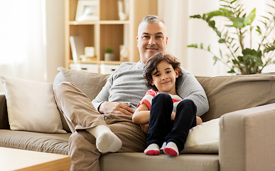 Image showing happy father with little son at home