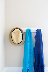 Image showing Wall in House with Hat and Scarfs Hanging on Coat Rack Hooks Abs