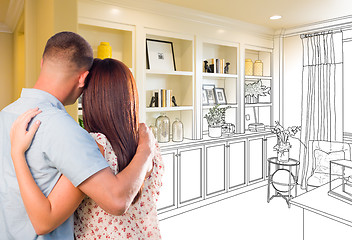 Image showing Young Military Couple Facing Custom Built-in Shelves and Cabinet