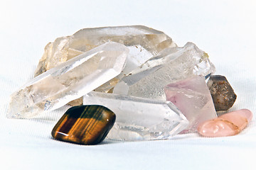 Image showing surface level quartz and cats eye on white