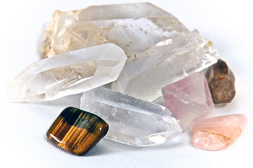 Image showing quartz and cats eye stone on white