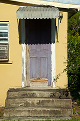 Image showing rotting door on neglected building