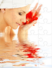 Image showing lady with red petals in water puzzle