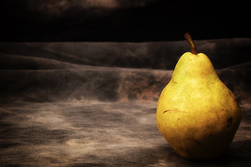 Image showing one ripe bosc pear on gray studio backdrop