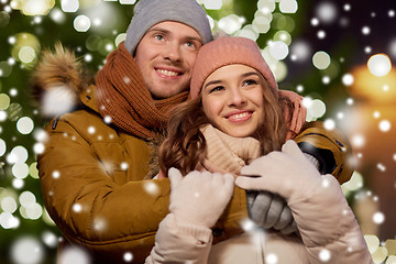 Image showing happy couple hugging at christmas tree