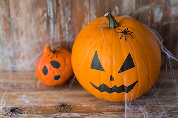 Image showing halloween pumpkins with spiders and cobweb