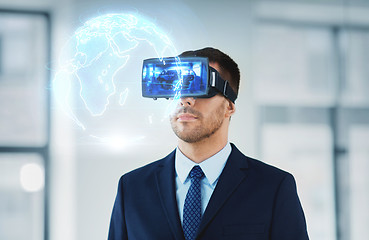 Image showing businessman with virtual reality headset at office