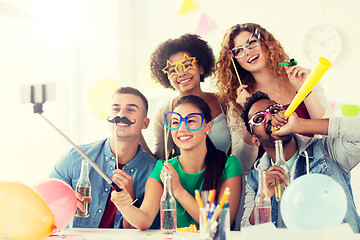 Image showing happy team taking selfie at office party