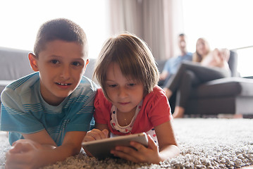 Image showing couple spending time with kids