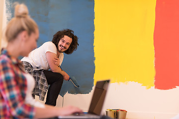 Image showing Happy couple doing home renovations