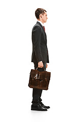 Image showing Full body portrait of businessman with folder on white