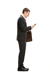 Image showing Full body portrait of businessman with briefcase on white