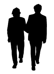 Image showing Senior couple walking arm in arm