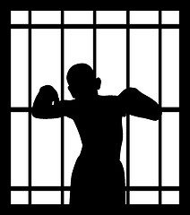 Image showing Man in jail behind bars