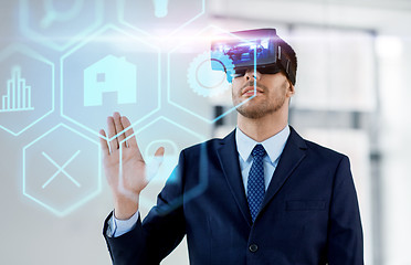 Image showing businessman with virtual reality headset at office
